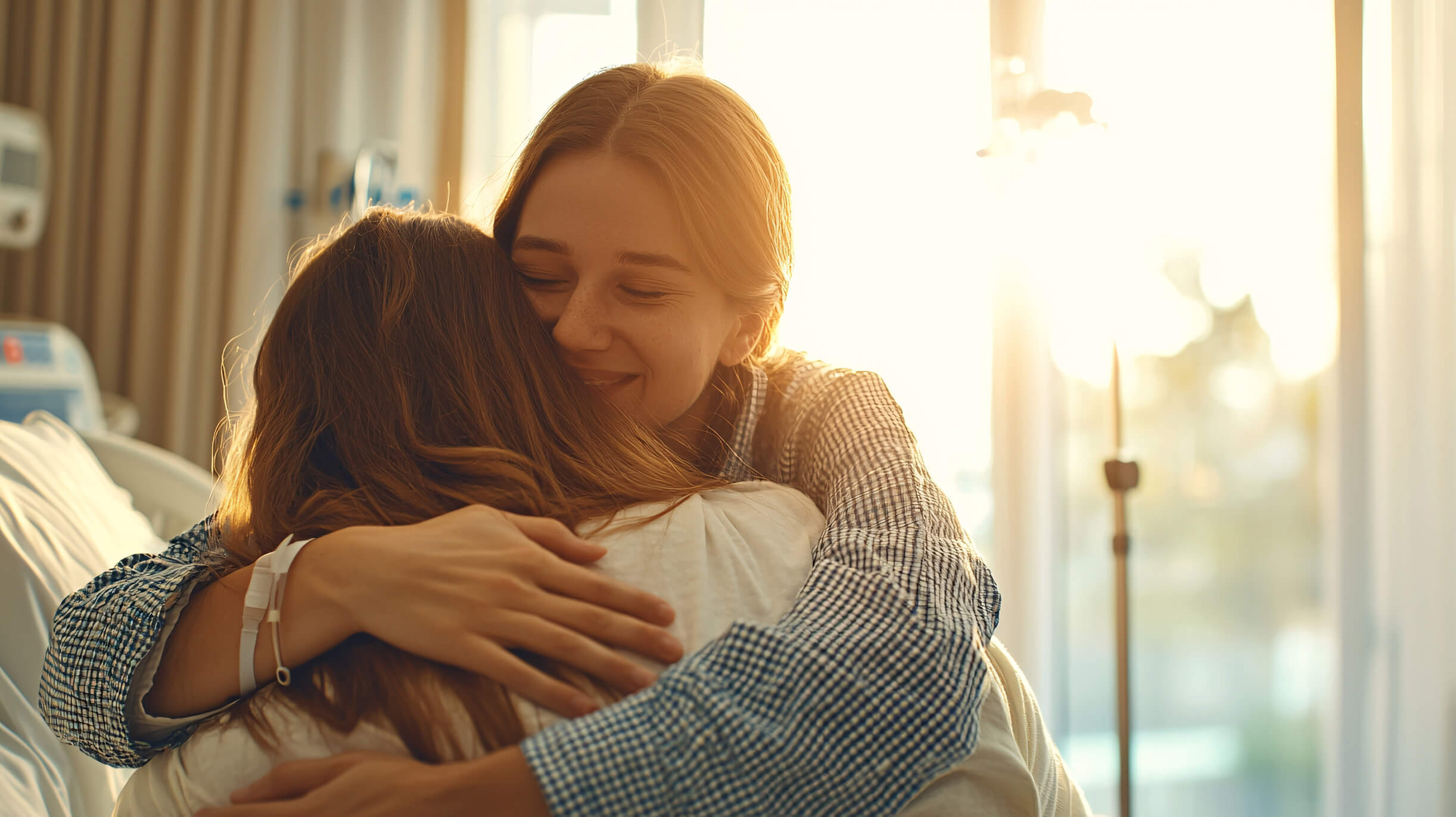 Two women hugging