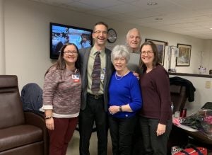 Sharon (center) was joined by her family to celebrate her last day of chemotherapy at Riverview Health on Oct. 30, 2019. Two of Sharon’s children—Dr. Eric Marcotte (left) and Betsy Zile, NP (far left)—are also Riverview Health employees, something that made Sharon feel even more at home at the hospital.