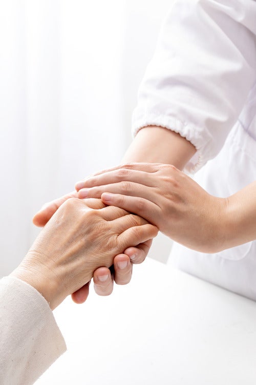 Women holding hands